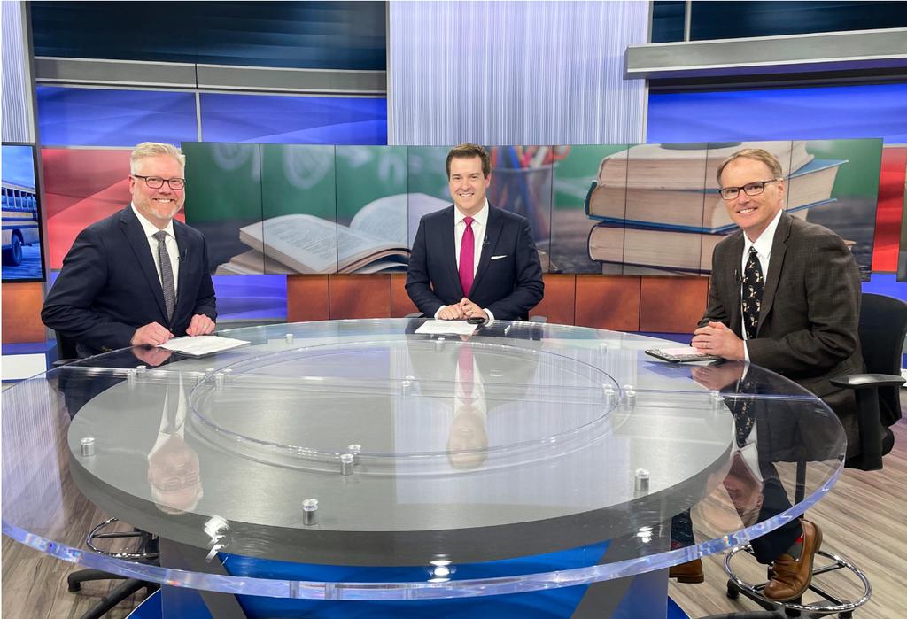 KMBC Channel 9 set with Park Hill Superintendent Dr. Mike Kimbrel, Host Cody Holyoke, and Ray-Pec Superintendent Dr. Mike Slagle